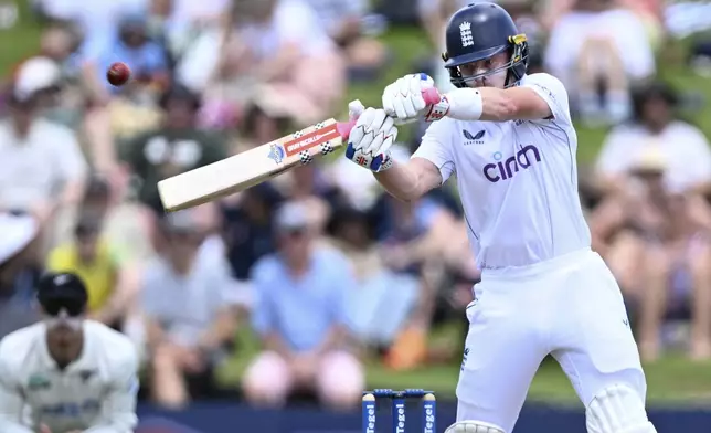 England's Ollie Pope bats during play on day two of the third cricket test between England and New Zealand in Hamilton, New Zealand, Sunday, Dec. 15, 2024. (Andrew Cornaga/Photosport via AP)