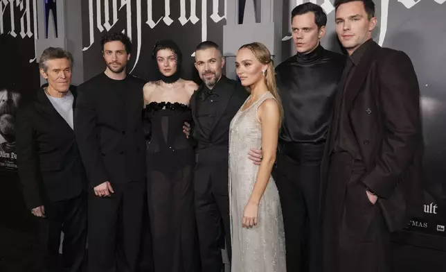 Willem Dafoe, from left, Aaron Taylor-Johnson, Emma Corrin, Robert Eggers, Lily-Rose Depp, Bill Scarsgard, and Nicholas Hoult arrive at the premiere of "Nosferatu" on Thursday, Dec. 12, 2024, at TCL Chinese Theatre in Los Angeles. (Photo by Jordan Strauss/Invision/AP)