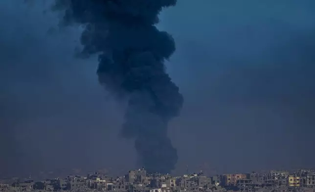 FILE - Smoke rises following an Israeli airstrike in the Gaza Strip, as seen from southern Israel, Dec. 29, 2023. (AP Photo/Ariel Schalit, File)