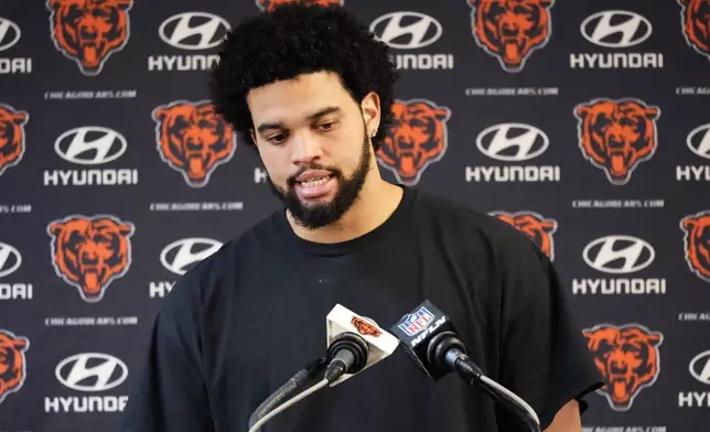 Chicago Bears quarterback Caleb Williams talks with reporters after an NFL football game against the Seattle Seahawks, Thursday, Dec. 26, 2024, in Chicago. (AP Photo/Nam Y. Huh)