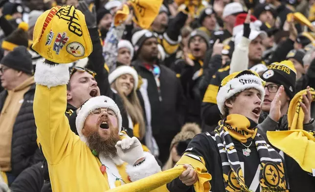 Pittsburgh Steelers fans cheer during the first half of an NFL football game between the Pittsburgh Steelers and the Kansas City Chiefs, Wednesday, Dec. 25, 2024, in Pittsburgh. (AP Photo/Gene J. Puskar)