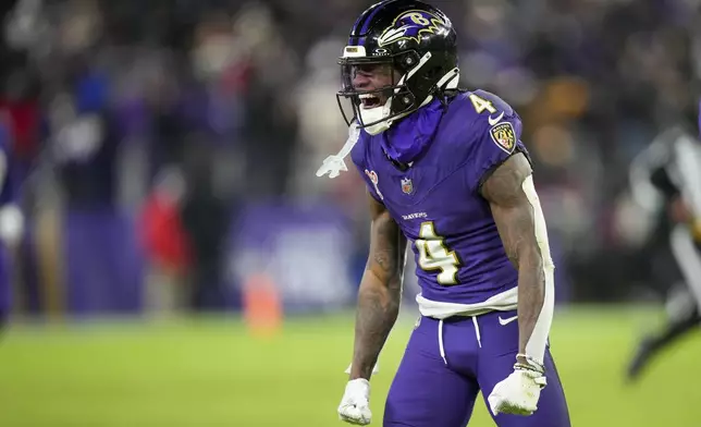 Baltimore Ravens wide receiver Zay Flowers reacts after making a catch against the Pittsburgh Steelers during the second half of an NFL football game, Saturday, Dec. 21, 2024, in Baltimore. (AP Photo/Stephanie Scarbrough)