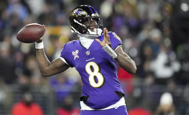 Baltimore Ravens quarterback Lamar Jackson throws a pass against the Pittsburgh Steelers during the first half of an NFL football game, Saturday, Dec. 21, 2024, in Baltimore. (AP Photo/Stephanie Scarbrough)