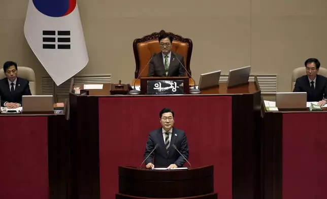 Park Chan-dae, floor leader of the Democratic Party, speaks during the plenary session for the impeachment vote of President Yoon Suk Yeol at the National Assembly in Seoul, South Korea, on Saturday, Dec.14, 2024.(Woohae Cho/Pool Photo via AP)