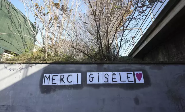 A poster "Thank you Gisele" is pictured, Saturday, Dec. 14, 2024 in Avignon, southern France, near the courthouse where the Mazan rape trial is taking place. (AP Photo/Aurelien Morissard)