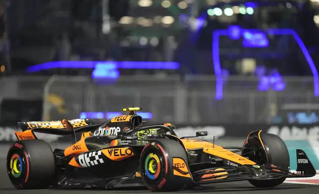 McLaren driver Lando Norris of Britain in action during the qualifying for the Formula One Abu Dhabi Grand Prix at the Yas Marina Circuit in Abu Dhabi, UAE, Saturday, Dec. 7, 2024. (AP Photo/Darko Bandic)