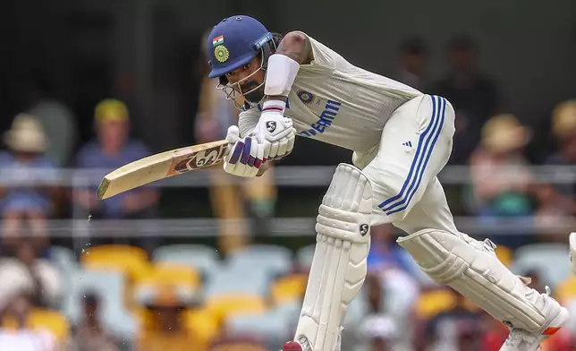 India's KL Rahul plays a shot during play on day four of the third cricket test between India and Australia at the Gabba in Brisbane, Australia, Tuesday, Dec. 17, 2024. (AP Photo/Pat Hoelscher)