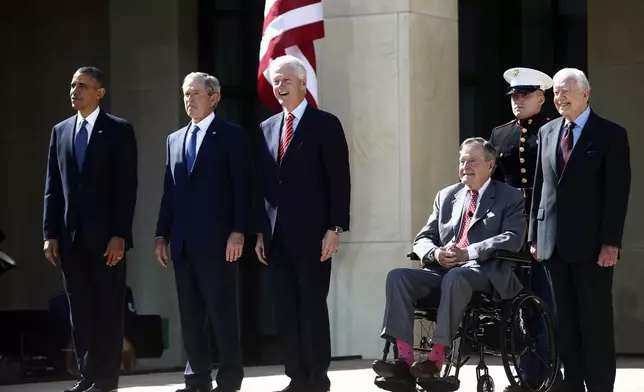 FILE - President Barack Obama, from left, stands with former Presidents George W. Bush, Bill Clinton, George H.W. Bush and Jimmy Carter at the dedication of the George W. Bush Presidential Library on the campus of Southern Methodist University in Dallas, April 25, 2013. (AP Photo/Charles Dharapak, File)