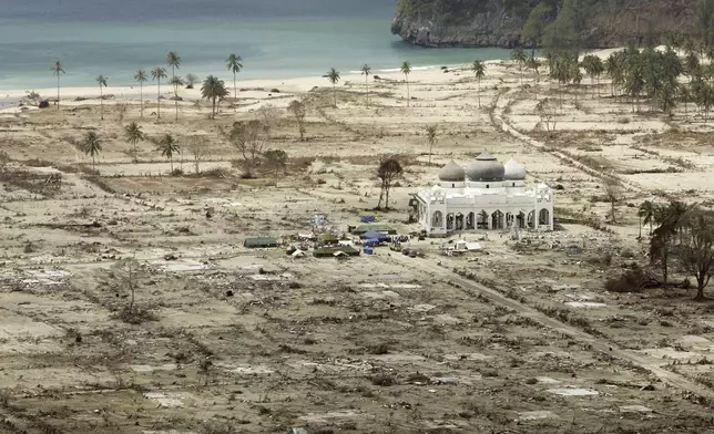 The Rahmatullah Lampuuk Mosque stands intact after the 2004 tsunami hit the area in Lhoknga, near Banda Aceh, Indonesia, Jan. 30, 2005. (AP Photo/Greg Baker, File)