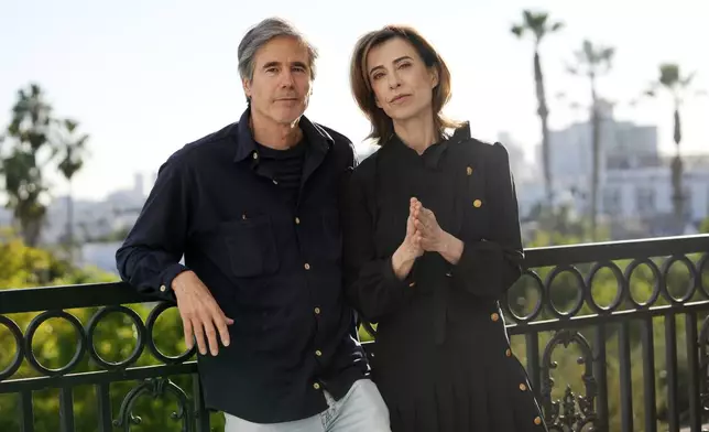 FILE - Walter Salles, left, director of the film "I'm Still Here," and cast member Fernanda Torres pose for a portrait to promote the film, Nov. 13, 2024, in West Hollywood, Calif. (AP Photo/Chris Pizzello, File)