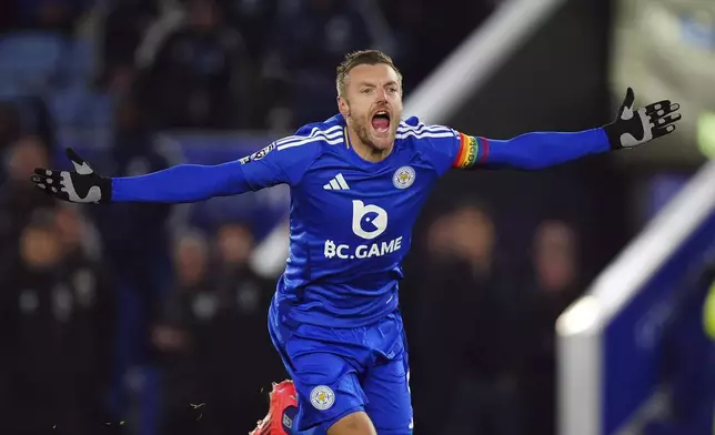 Leicester City's Jamie Vardy celebrates after scoring the opening goal during the English Premier League soccer match between Leicester City and West Ham United at the King Power Stadium in Leicester, England, Tuesday, Dec. 3, 2024. (Mike Egerton/PA via AP)