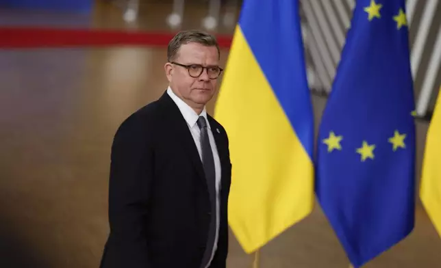 FILE - Finland's Prime Minister Petteri Orpo arrives for an EU summit at the European Council building in Brussels, Thursday, Dec. 19, 2024. (AP Photo/Geert Vanden Wijngaert, File)