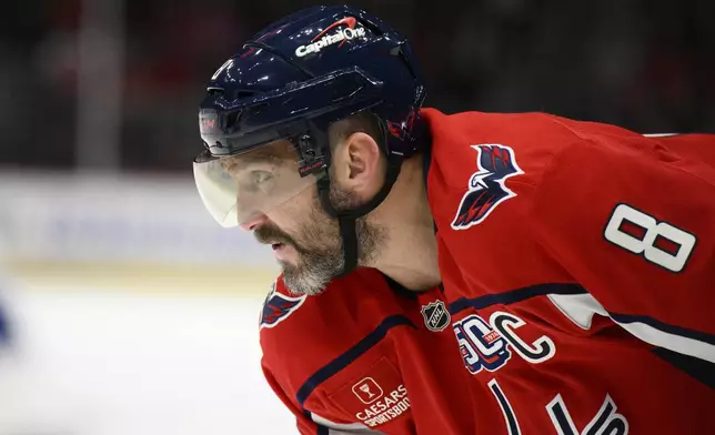 FILE - Washington Capitals left wing Alex Ovechkin looks on during the first period of an NHL hockey game against the Toronto Maple Leafs, Nov. 13, 2024, in Washington. (AP Photo/Nick Wass, File)