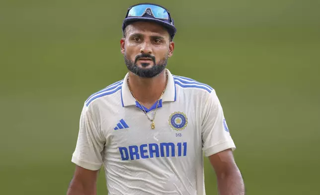 India's Akash Deep looks on during play on day five of the third cricket test between India and Australia at the Gabba in Brisbane, Australia, Wednesday, Dec. 18, 2024. (AP Photo/Pat Hoelscher)