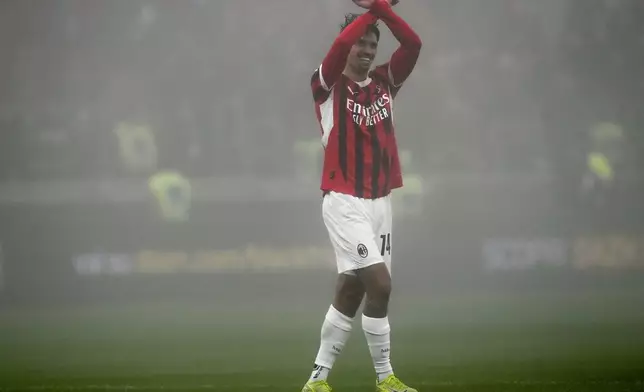 AC Milan's Tijjani Reijnders celebrates scoring his side's second goal during the Italian Serie A soccer match between AC Milan and Empoli, at the Milan San Siro stadium, Italy, Saturday, Nov. 30, 2024. (AP Photo/Luca Bruno)