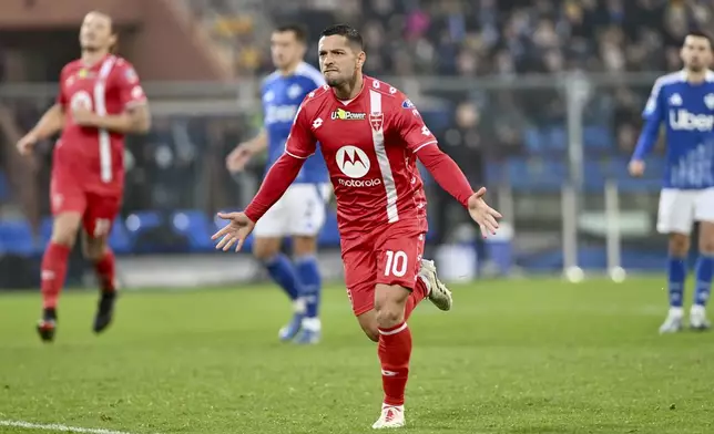 AC Monza's Gianluca Caprari celebrates scoring during the Serie A soccer match between Como and Monza at the Giuseppe Sinigaglia stadium in Como, Italy, Saturday Nov. 30, 2024. (Antonio Saia/LaPresse via AP)