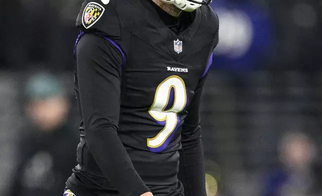 Baltimore Ravens kicker Justin Tucker reacts after missing a second field goal during the second half of an NFL football game against the Philadelphia Eagles, Sunday, Dec. 1, 2024, in Baltimore. (AP Photo/Nick Wass)