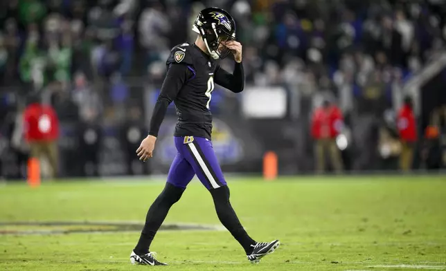 Baltimore Ravens kicker Justin Tucker misses a field goal against the Philadelphia Eagles during the second half of an NFL football game, Sunday, Dec. 1, 2024, in Baltimore. (AP Photo/Nick Wass)