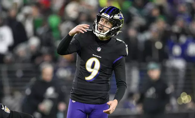 Baltimore Ravens kicker Justin Tucker watches his kick as he misses a second field goal attempt during the second half of an NFL football game against the Philadelphia Eagles, Sunday, Dec. 1, 2024, in Baltimore. (AP Photo/Nick Wass)