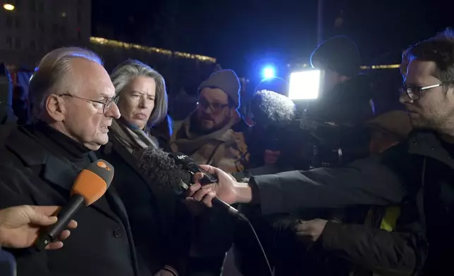 Reiner Haseloff (M, CDU), Minister President of Saxony-Anhalt, makes a statement after an incident at the Christmas market in Magdeburg, Germany, Friday Dec. 20, 2024. (Heiko Rebsch/dpa via AP)