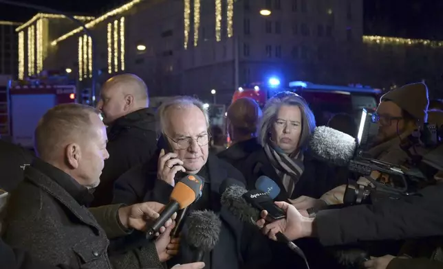 Reiner Haseloff (M, CDU), Minister President of Saxony-Anhalt, makes a statement after an incident at the Christmas market in Magdeburg, Germany, Friday Dec. 20, 2024. (Heiko Rebsch/dpa via AP)