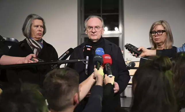 Reiner Haseloff, Minister President of Saxony-Anhalt, center, is flanked by Tamara Zieschang, Minister of the Interior and Sport of Saxony-Anhalt, left, and Simone Borris, Mayor of the City of Magdeburg, at a press conference after a car plowed into a busy outdoor Christmas market in Magdeburg, Germany Friday, Dec. 20, 2024. (Hendrik Schmidt/dpa via AP)