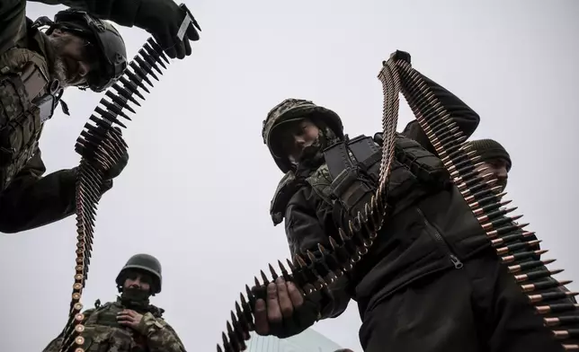 In this photo provided by Ukraine's 24th Mechanised Brigade press service, servicemen of the 24th Mechanised Brigade improve their tactical skills at the training field in Donetsk region, Ukraine, Friday, Nov. 29, 2024. (Oleg Petrasiuk/Ukrainian 24th Mechanised Brigade via AP)