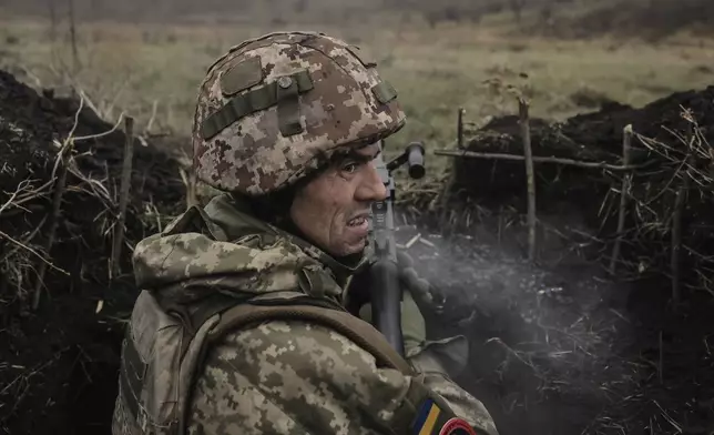 In this photo provided by Ukraine's 24th Mechanised Brigade press service, a serviceman of the 24th Mechanised Brigade improves his tactical skills at the training field in Donetsk region, Ukraine, Friday, Nov. 29, 2024. (Oleg Petrasiuk/Ukrainian 24th Mechanised Brigade via AP)