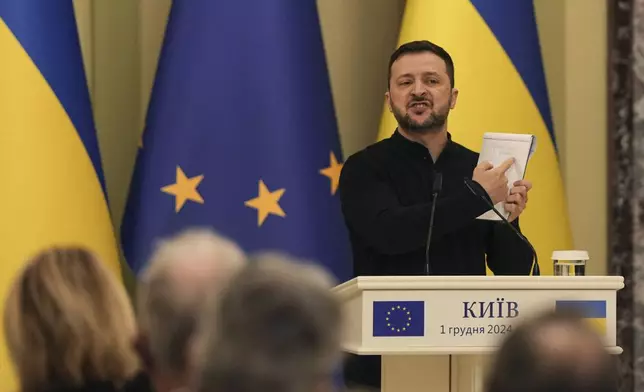 Ukraine's President Volodymyr Zelenskyy speaks during a joint press conference with European Council President Antonio Costa, in Kyiv, Ukraine, Sunday, Dec. 1, 2024. (AP Photo/Evgeniy Maloletka)