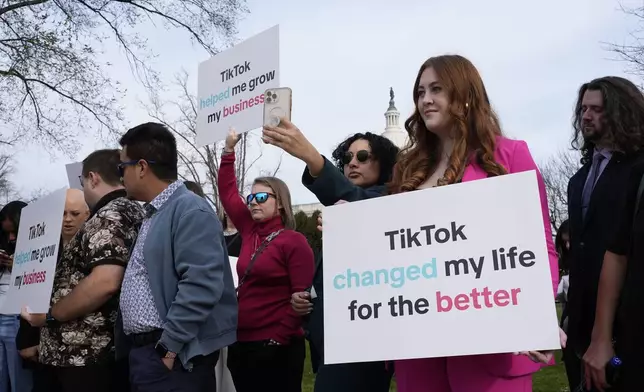 FILE - Devotees of TikTok gather at the Capitol in Washington, as the House passed a bill that would lead to a nationwide ban of the popular video app if its China-based owner doesn't sell, on March 13, 2024. (AP Photo/J. Scott Applewhite, File)