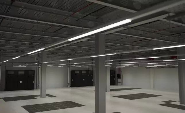 An empty data hall inside a data center from Texas-based Digital Realty, in Dublin, Ireland, Thursday, Oct. 17, 2024. (AP Photo/Bram Janssen)