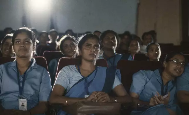 This image released by Janus and Sideshow Films shows Kani Kusruti, center, in a scene from "All We Imagine As Light." (Janus and Sideshow Films via AP)