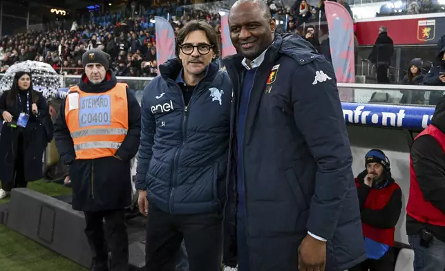 Genoa's head coach Patrick Vieira, right, and Torino's head coach Paolo Vanoli pose ahead of the Italian Serie A soccer match between Genoa and Torino at the Luigi Ferraris Stadium in Genoa, Italy, Saturday, Dec. 7, 2024. (Tano Pecoraro/LaPresse via AP)