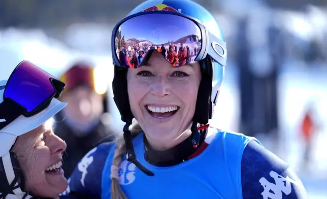 Lindsey Vonn talks with fans after racing at Copper Mountain Ski Resort, Sunday, Dec. 8, 2024, in Copper Mountain, Colo. (AP Photo/Robert F. Bukaty)