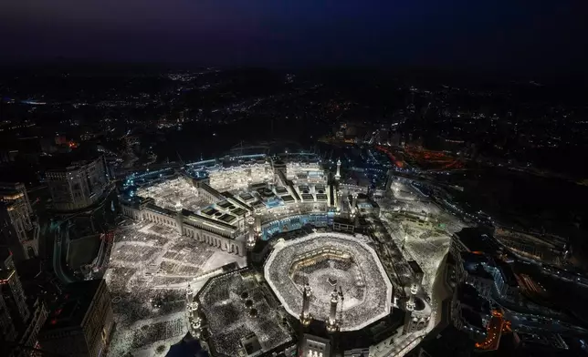 Muslim pilgrims circumambulate the Kaaba, the cubic building at the Grand Mosque, during the annual Hajj pilgrimage in Mecca, Saudi Arabia, on June 11, 2024. (AP Photo/Rafiq Maqbool)