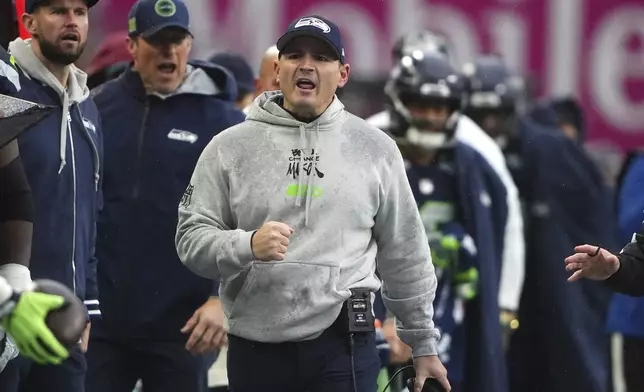 Seattle Seahawks head coach Mike Macdonald reacts during the first half of an NFL football game against the Minnesota Vikings, Sunday, Dec. 22, 2024, in Seattle. (AP Photo/Lindsey Wasson)