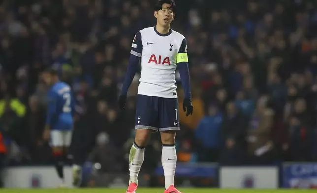 Tottenham's Son Heung-min reacts after Rangers' Hamza Igamane scored the opening goal during the Europa League opening phase soccer match between Glasgow Rangers and Tottenham Hotspur at Ibrox stadium in Glasgow, Thursday, Dec. 12, 2024. (AP Photo/Scott Heppell)