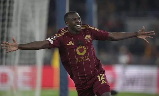 Roma's Saud Abdulhamid celebrates after scoring his side's second goal during the Europa League Soccer match between Roma and Braga at Rome's Olympic stadium, Thursday, Dec. 12, 2024. (Alfredo Falcone/LaPresse via AP)