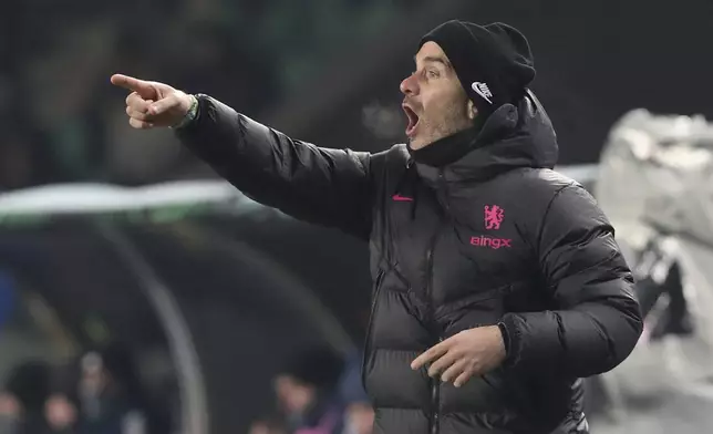 Chelsea's head coach Enzo Maresca directs his players during the Europa Conference League opening phase soccer match between Astana and Chelsea at the Almaty Ortalyk stadium in Almaty, Kazakhstan, Thursday, Dec. 12, 2024. (AP Photo)