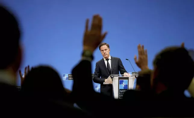 NATO Secretary General Mark Rutte takes questions during a media conference prior to a meeting of NATO foreign ministers at NATO headquarters in Brussels,Tuesday, Dec. 3, 2024. (AP Photo/Virginia Mayo)