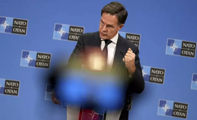 NATO Secretary General Mark Rutte speaks during a media conference prior to a meeting of NATO foreign ministers at NATO headquarters in Brussels,Tuesday, Dec. 3, 2024. (AP Photo/Virginia Mayo)