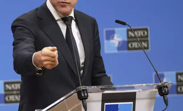 NATO Secretary General Mark Rutte speaks during a media conference prior to a meeting of NATO foreign ministers at NATO headquarters in Brussels,Tuesday, Dec. 3, 2024. (AP Photo/Virginia Mayo)