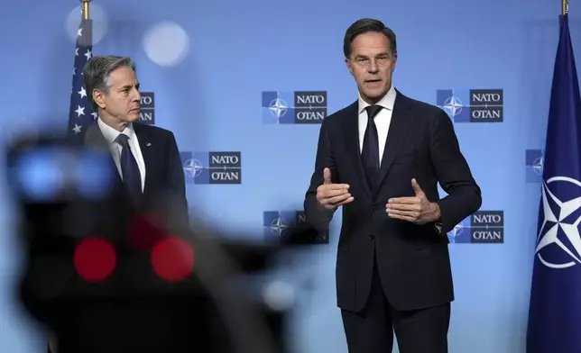 United States Secretary of State Antony Blinken, left, and NATO Secretary General Mark Rutte deliver a statement ahead of a meeting of NATO foreign ministers at NATO headquarters in Brussels,Tuesday, Dec. 3, 2024. (AP Photo/Virginia Mayo)