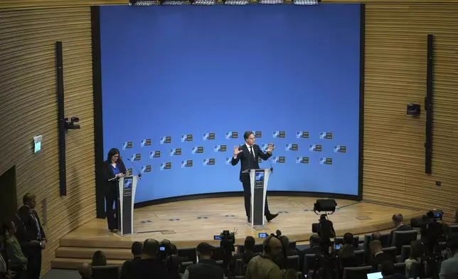 NATO Secretary General Mark Rutte speaks during a media conference prior to a meeting of NATO foreign ministers at NATO headquarters in Brussels,Tuesday, Dec. 3, 2024. (AP Photo/Virginia Mayo)