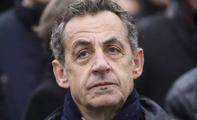 FILE - In this Monday Nov. 11, 2019 file photo, French former president Nicolas Sarkozy attends a ceremony at the Arc de Triomphe in Paris. (Ludovic Marin/Pool via AP, file)