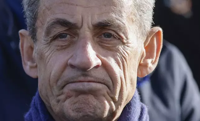 FILE - Former French President Nicolas Sarkozy looks on as he attends a ceremony at the Arc de Triomphe, as part of the commemorations marking the105th anniversary of the Nov. 11, 1918 Armistice, ending World War I, Saturday, Nov. 11, 2023 in Paris. (Ludovic Marin/Pool via AP, File)