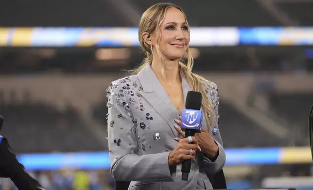 Nikki Glaser participates in a segment after an NFL football game between the Los Angeles Chargers and the Denver Broncos, Thursday, Dec. 19, 2024, in Inglewood, Calif. (AP Photo/Eric Thayer)