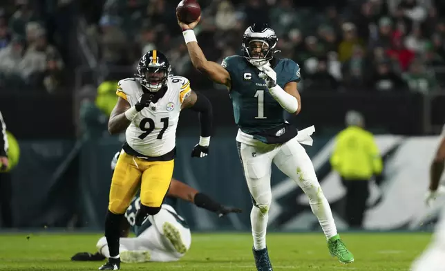 Philadelphia Eagles quarterback Jalen Hurts (1) throws the ball during the second half of an NFL football game against the Pittsburgh Steelers on Sunday, Dec. 15, 2024, in Philadelphia. (AP Photo/Derik Hamilton)