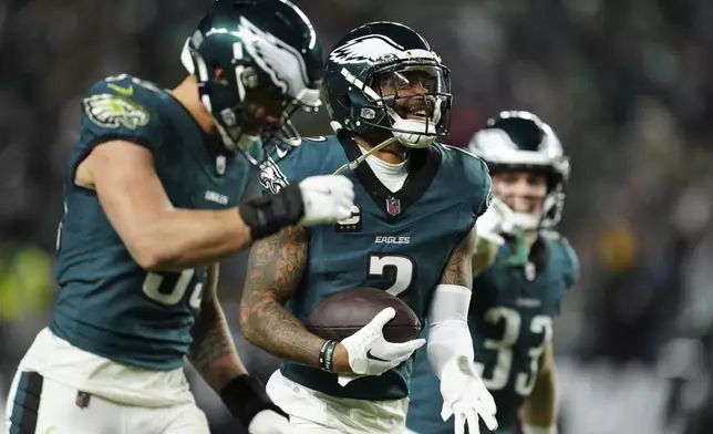 Philadelphia Eagles cornerback Darius Slay Jr., center, reacts after he recovered a fumble during the second half of an NFL football game against the Pittsburgh Steelers on Sunday, Dec. 15, 2024, in Philadelphia. (AP Photo/Derik Hamilton)