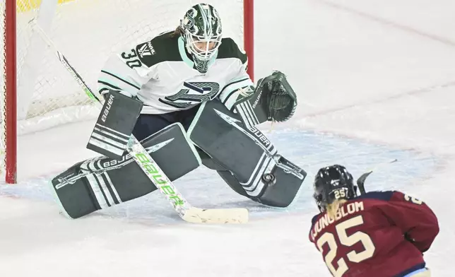 Montreal Victoire's Lina Ljungblom (25) shoots against Boston Fleet goaltender Emma Soderberg (30) during first-period PWHL hockey game action in Laval, Quebec, Monday, Dec. 30, 2024. (Graham Hughes/The Canadian Press via AP)Canadian Press via AP)